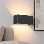 Nordic modern LED wall light on a styled living room wall