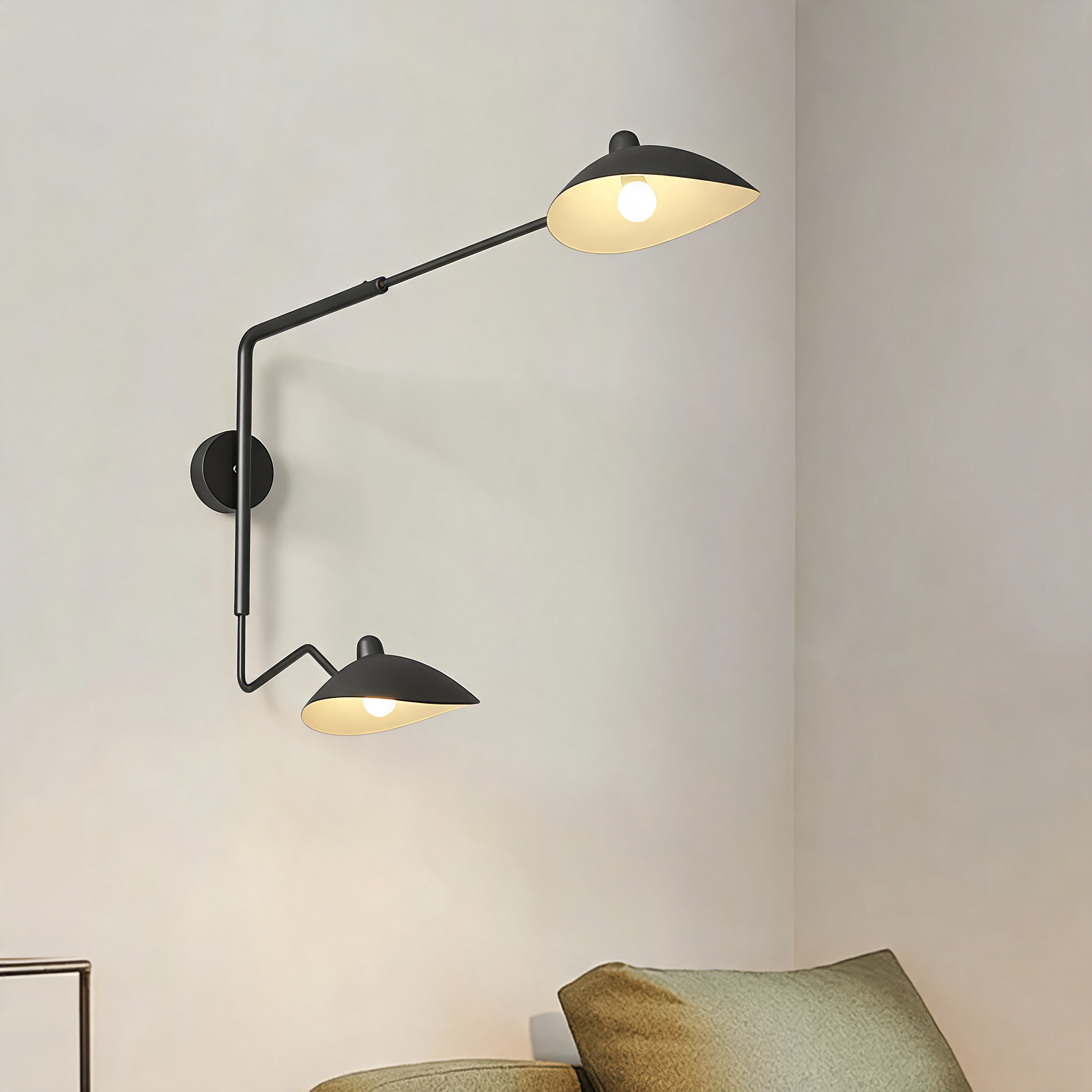 French design long arm wall sconce above a sofa in a styled living room